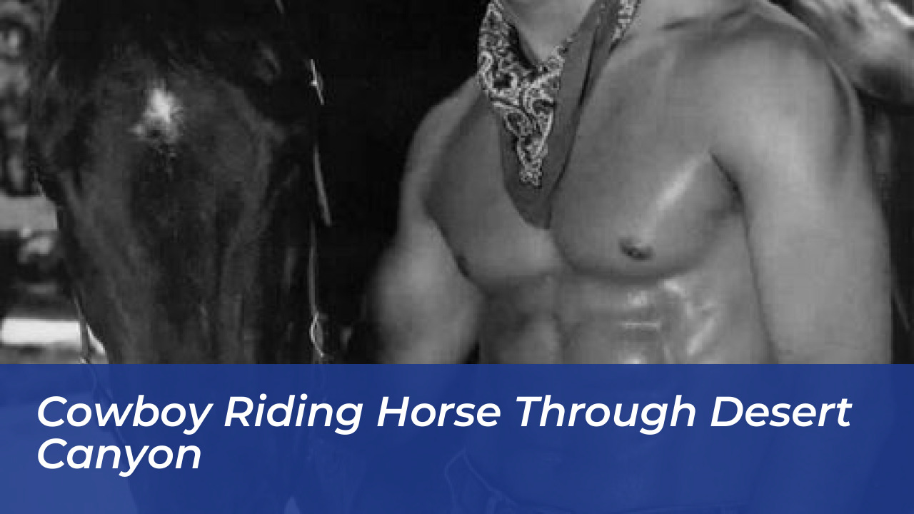 Cowboy riding horse through desert canyon
