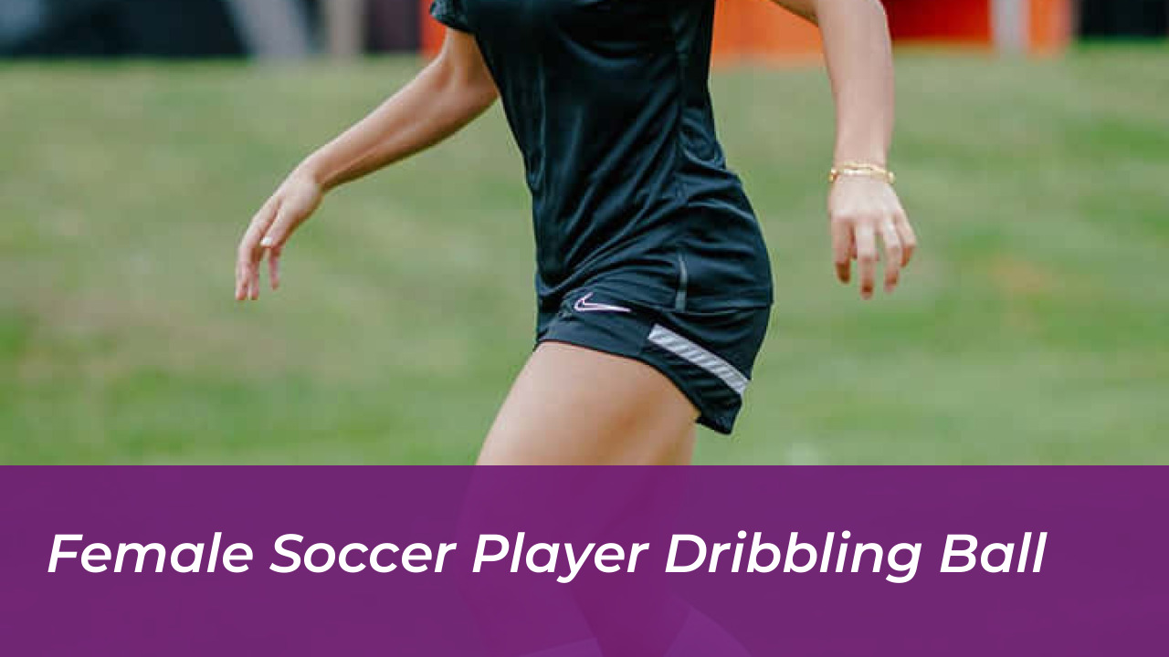 Female Soccer Player Dribbling Ball
