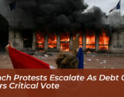 french protests escalate as debt crisis nears critical vote V2Vn