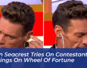 ryan seacrest tries on contestants earrings on wheel of fortune ckTa