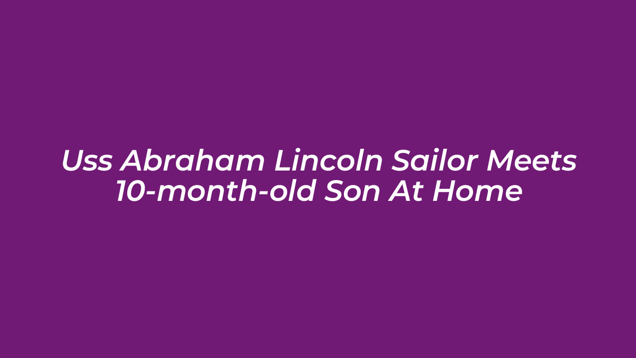 uss abraham lincoln sailor meets 10 month old son at home D5wS